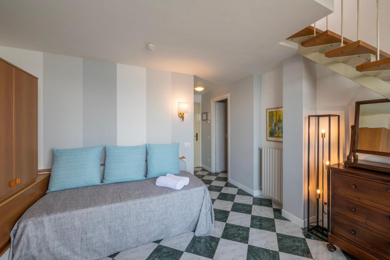 Hotel Beau Rivage Бавено Екстериор снимка